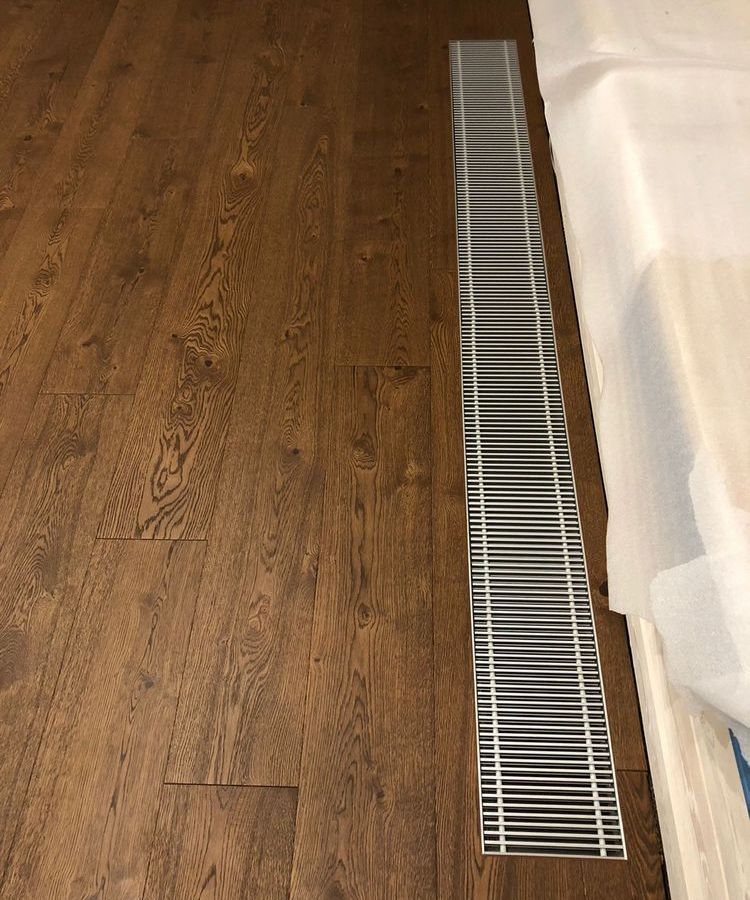 Укладка паркета с внутрипольным конвектором