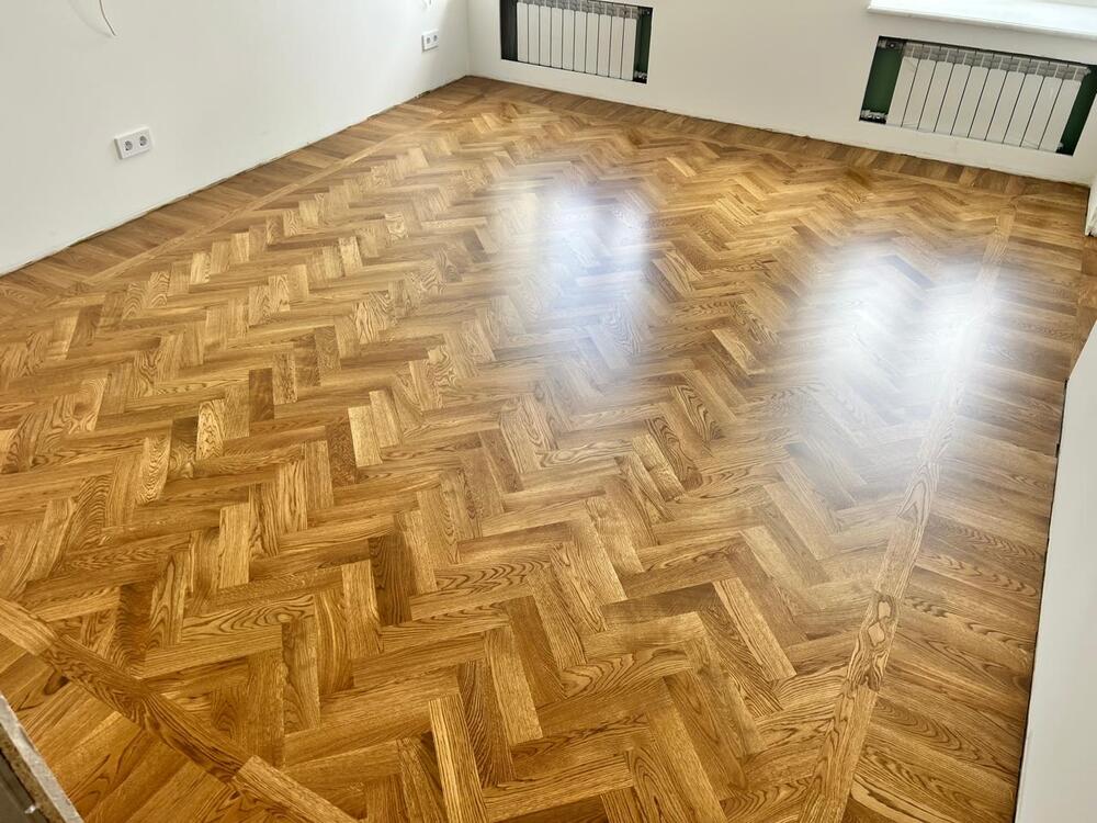 Укладка штучного паркета английской елкой